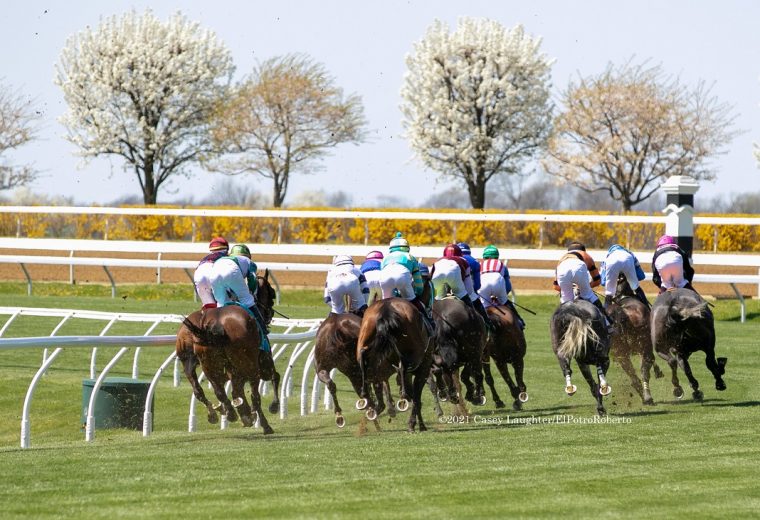 The field for race 4 at Keeneland head into the first turn, April 3, 2021.