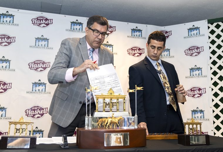 Monmouth Park Racing Secretary Gerry Stanislawzyk (L) and Stakes Coordinator Walter Cicero draw positions at the Post Position Draw and Press Conference for the 2025 Haskell Stakes at Monmouth Park Racetrack in Oceanport, NJ on Tuesday July 15, 2025. Photo By Bill Denver/EQUI-PHOTO