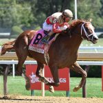 John Velazquez ganando con Antiquarian para Todd Pletcher - Coglianese Photo